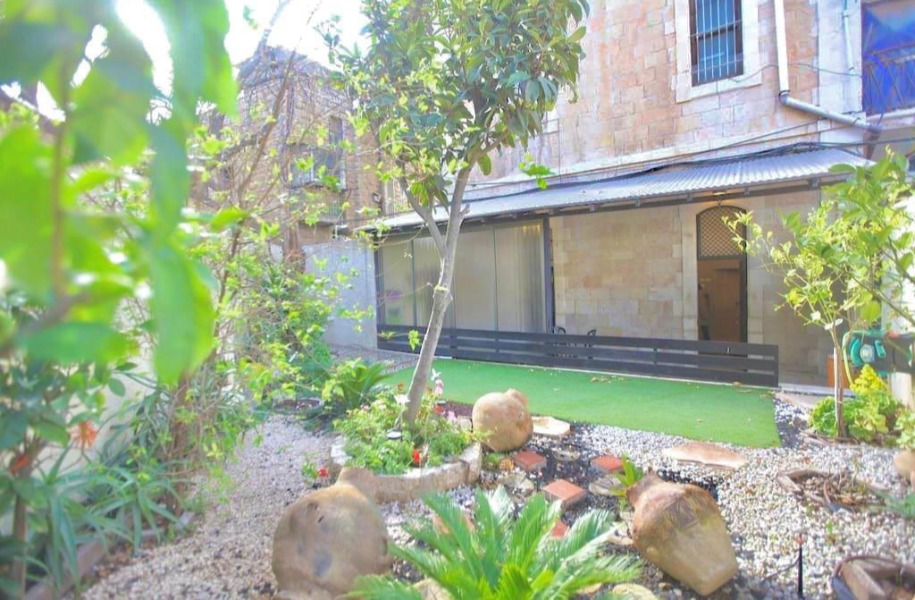 Image showcasing Magnificent Old Arab Garden apt . Abu Tor / Baka , 3 rooms with private ...